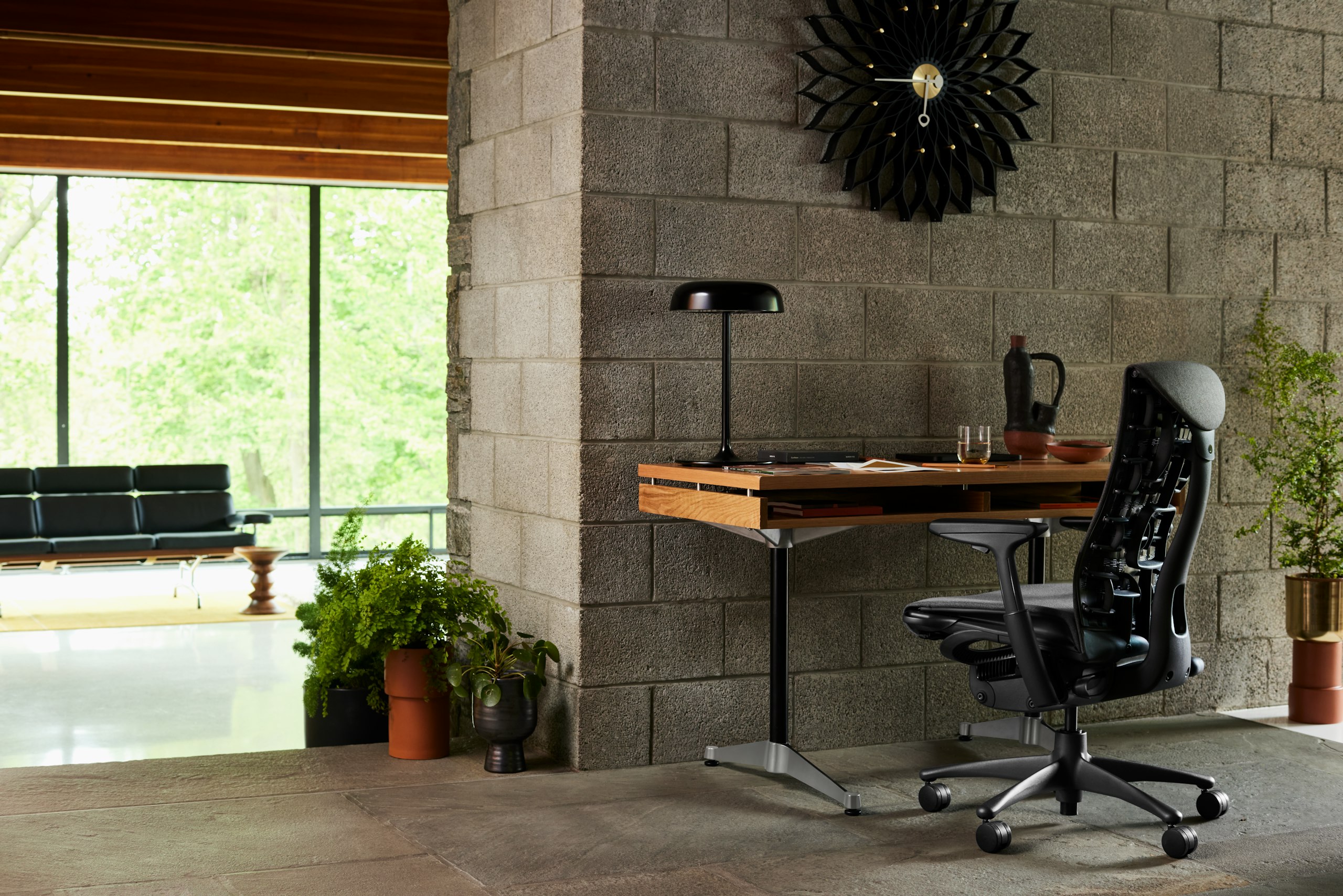 Embody Chair, Eames 2500 Series Executive Desk, Ode Desk Lamp, Nelson Sunflower Clock