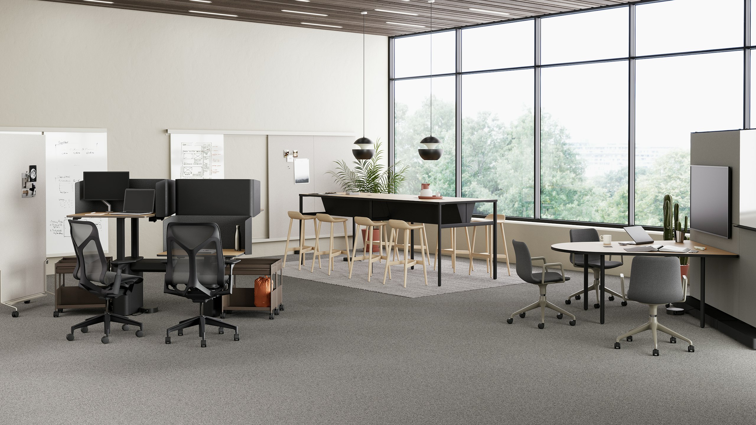 A selection of OE1 Workspace Collection products including OE1 Micro Pack, OE1 Communal Table, OE1 Agile Wall and OE1 Huddle Table are featured in a collaborative setting.